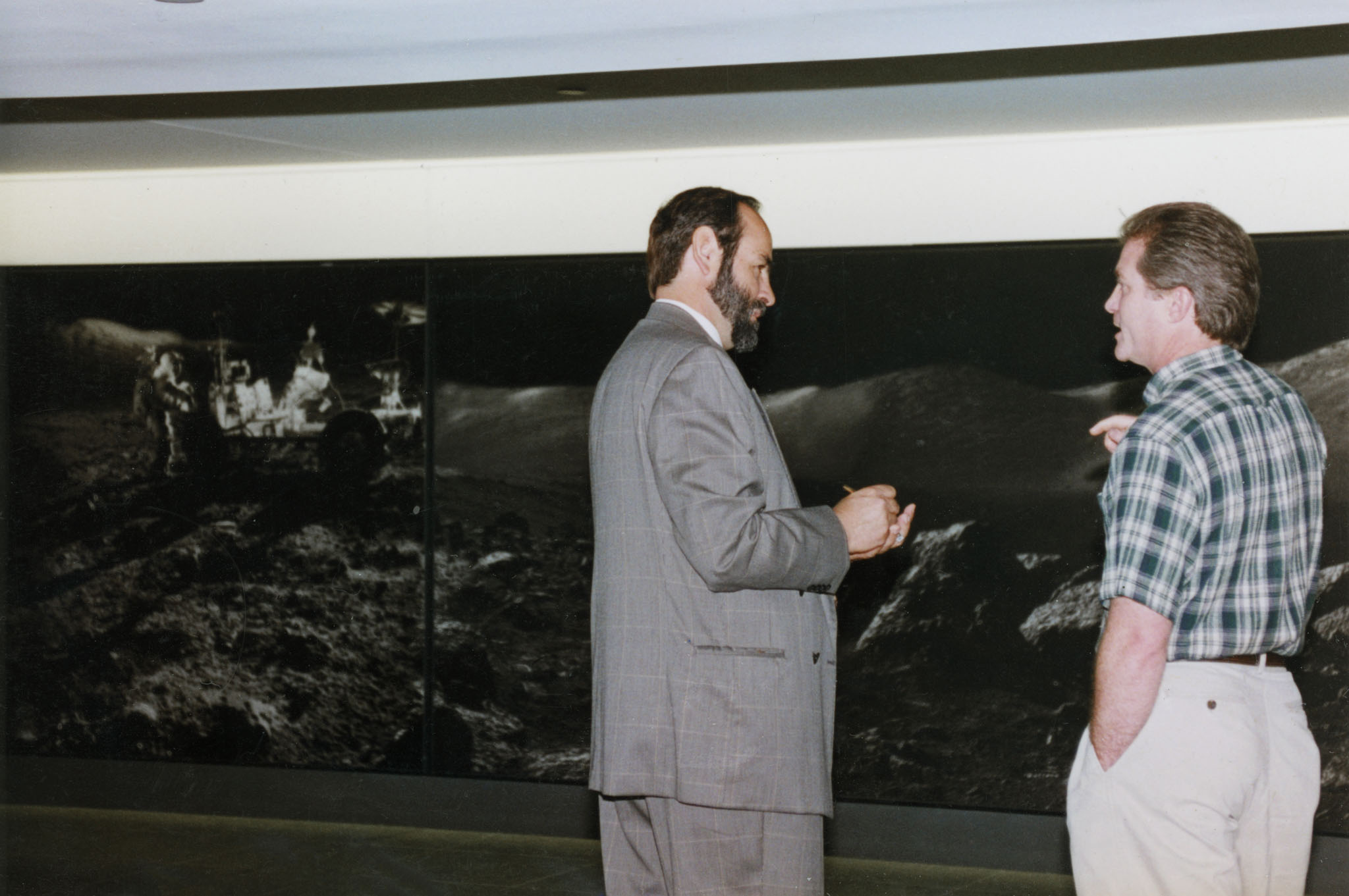 Carlos Fontanot works to install an imagery display in Houston early in his career.