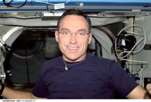 ISS004-E-5003 (December 2001) --- Astronaut Carl E. Walz, Expedition Four flight engineer, is photographed in the Destiny laboratory on the International Space Station (ISS). The image was taken with a digital still camera.