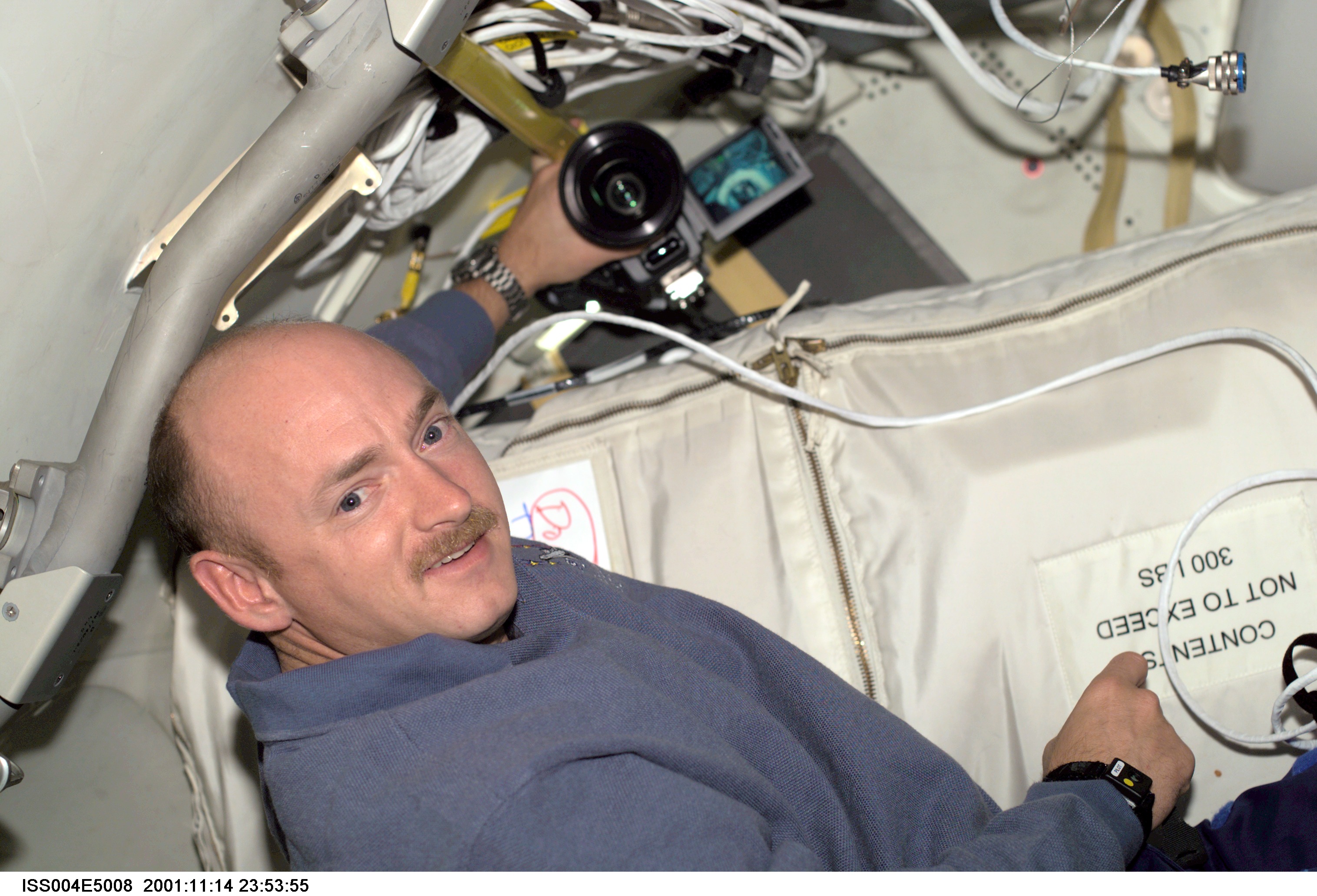 ISS004-E-5008 (December 2001) --- Astronaut Mark E. Kelly, STS-108 pilot, is photographed on the International Space Station (ISS). The image was t...