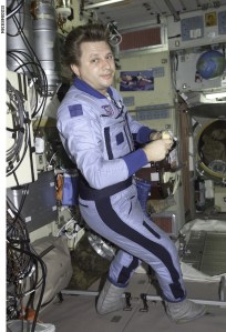 ISS004-E-8364 (3 March 2002) --- Cosmonaut Yury I. Onufrienko, Expedition Four mission commander representing Rosaviakosmos, is photographed in the Zvezda Service Module on the International Space Station (ISS). The image was taken with a digital still camera.
