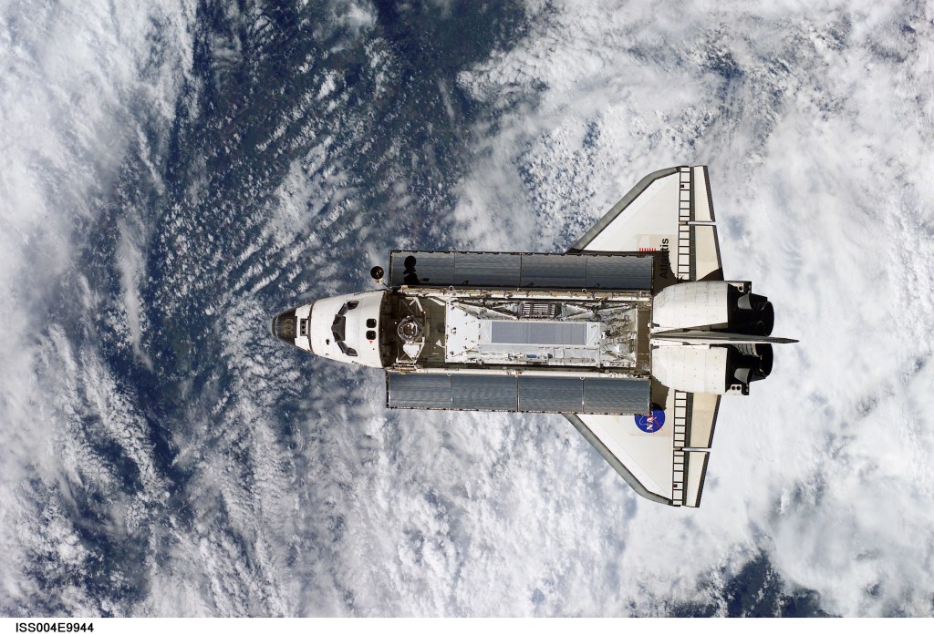 ISS004-E-9944 (10 April 2002) --- The Space Shuttle Atlantis prepares to dock with the International Space Station (ISS) during the STS-110 mission. Aboard Atlantis are astronauts Michael J. Bloomfield, mission commander; Stephen N. Frick, pilot; Rex J. Walheim, Ellen Ochoa, Lee M. E. Morin, Jerry L. Ross, and Steven L. Smith, all mission specialists. The STS-110 crewmembers are delivering the S0 (S-zero) truss, which is visible in Atlantis’ payload bay. This image was taken by an Expedition Four crewmember.