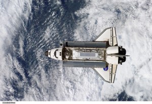 ISS004-E-9944 (10 April 2002) --- The Space Shuttle Atlantis prepares to dock with the International Space Station (ISS) during the STS-110 mission. Aboard Atlantis are astronauts Michael J. Bloomfield, mission commander; Stephen N. Frick, pilot; Rex J. Walheim, Ellen Ochoa, Lee M. E. Morin, Jerry L. Ross, and Steven L. Smith, all mission specialists. The STS-110 crewmembers are delivering the S0 (S-zero) truss, which is visible in Atlantis’ payload bay. This image was taken by an Expedition Four crewmember.