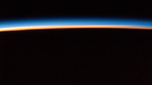 iss072e143829 (Nov. 2, 2024) -- The first rays of an orbital sunrise display pink and blue hues in Earth's atmosphere as the International Space Station orbited 257 miles above Austria.