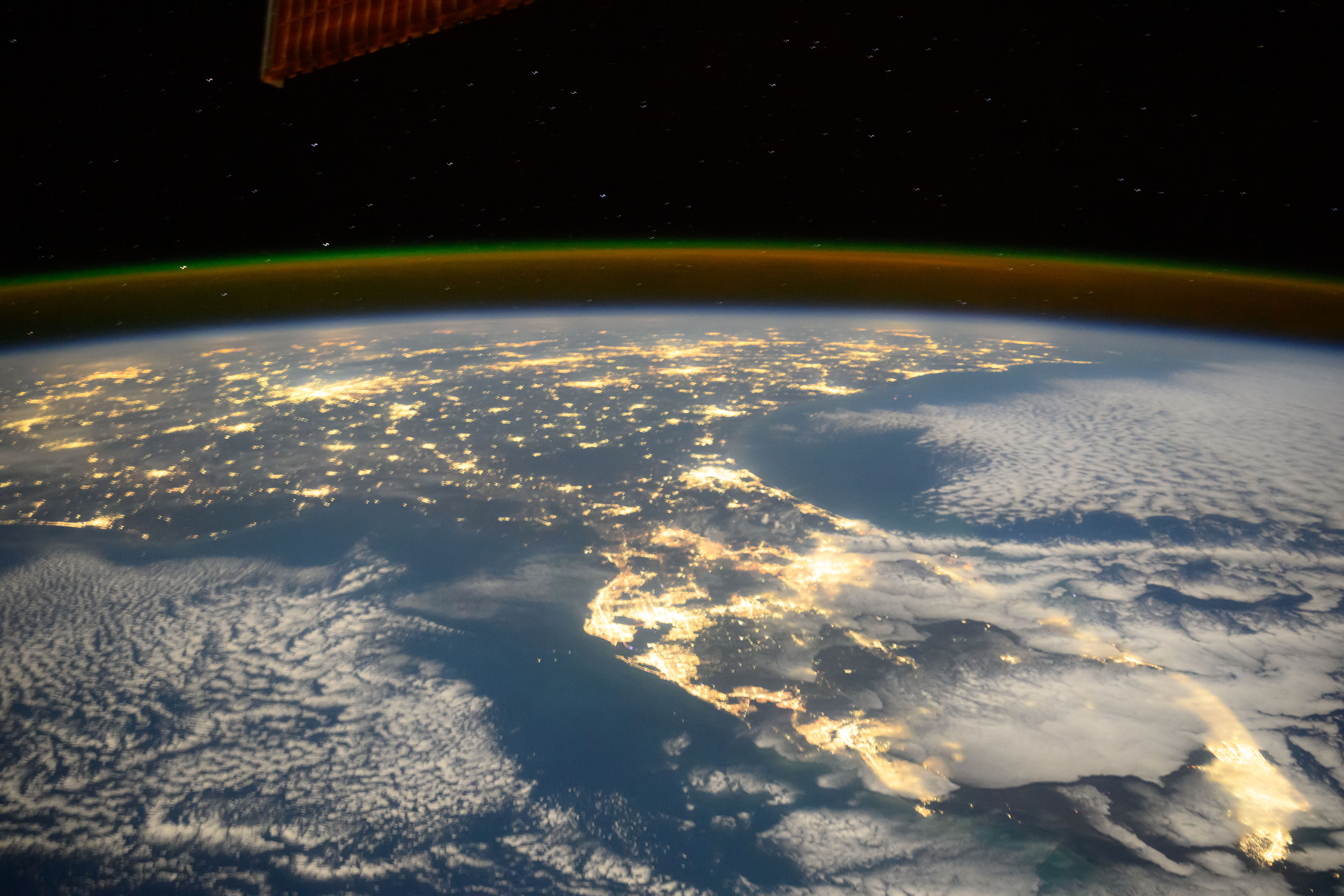 iss072e189824 (Nov. 17, 2024) -- As the International Space Station soared 257 miles above, NASA astronaut Suni Williams captured this image of Florida at night. City lights illuminate the state and both the Gulf and Atlantic coasts are visible in this image.