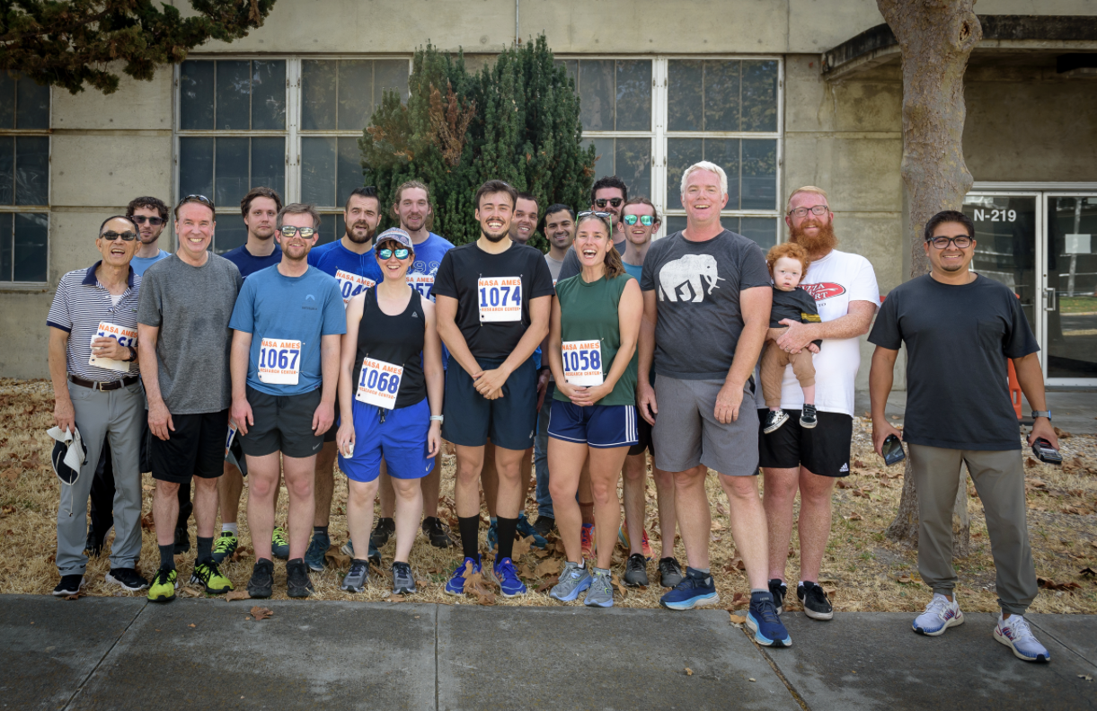Runners and organizers of the 2-mile Fun Run/Walk & Roll, sponsored by the Ames Fitness Center.