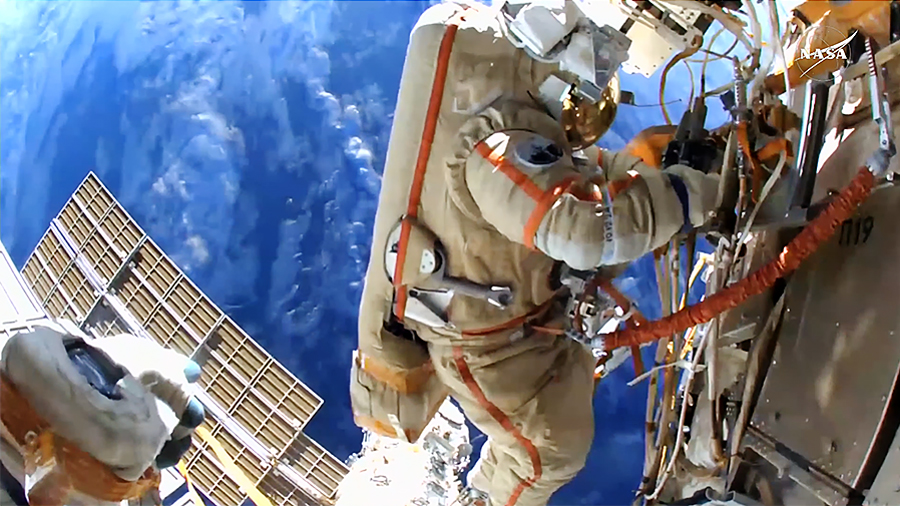 Cosmonaut Alexey Ovchinin conducts a spacewalk 260 miles above the Earth's surface and removes science hardware attached to the space station's Poisk module. Credit: NASA+
