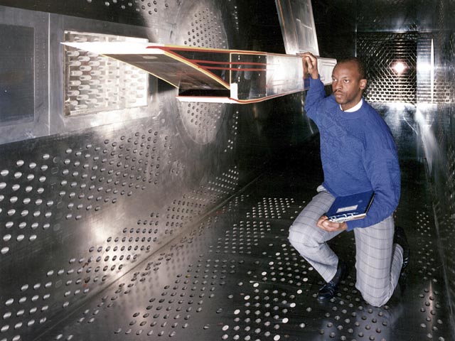 Technician next to the NASA Aerospace Plane (NASP) nozzle