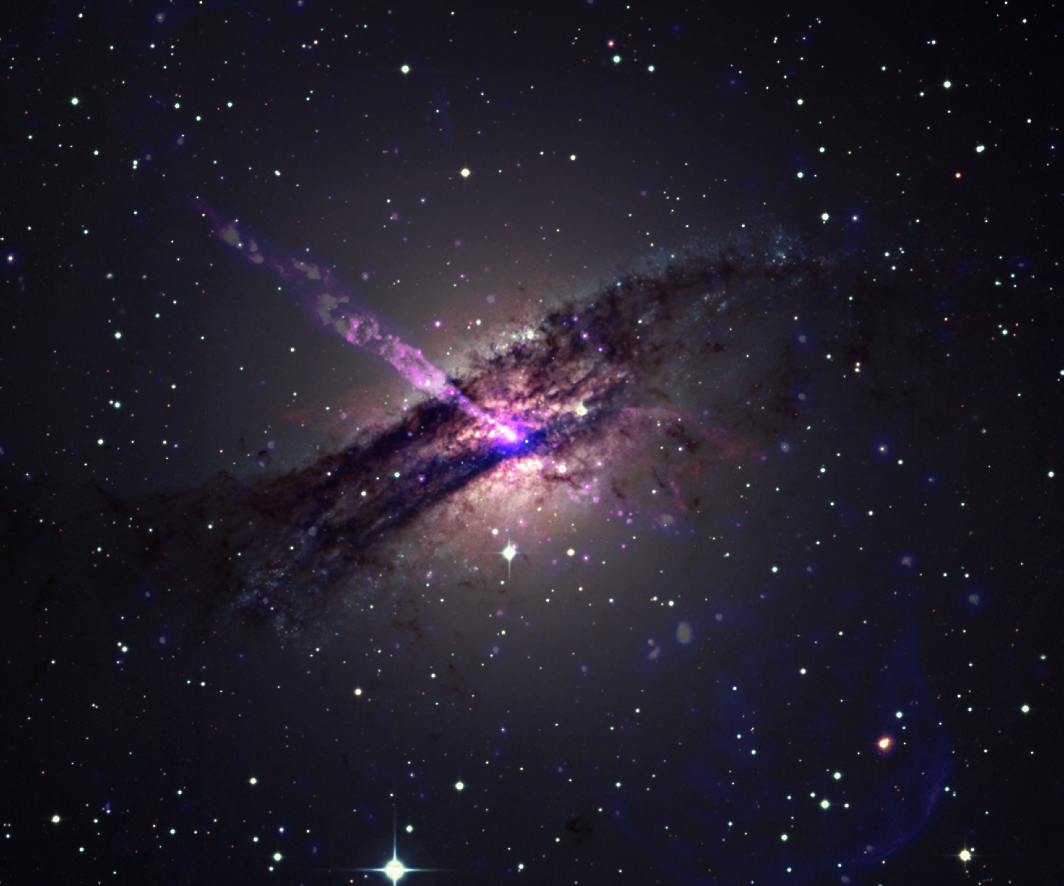 This is a colour composite photo of the peculiar galaxy Centaurus A (NGC 5128) , obtained with the Wide-Field Imager (WFI) camera at the ESO/MPG 2.2-m telescope on La Silla. It is based on a total of nine 3-min exposures made on March 25, 1999, through different broad-band optical filters (B(lue) - total exposure time 9 min - central wavelength 456 nm - here rendered as blue; V(isual) - 540 nm - 9 min - green; I(nfrared) - 784 nm - 9 min - red); it was prepared from files in the ESO Science Data Archive by ESO-astronomer Benoît Vandame. The elliptical shape and the central dust band, the imprint of a galaxy collision, are well visible.