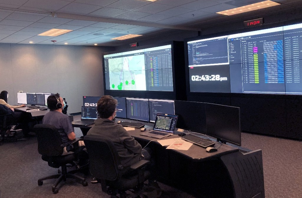 NASA researchers participating in a High Density Vertiplex (HDV) study in the Airspace Operations Laboratory (AOL).