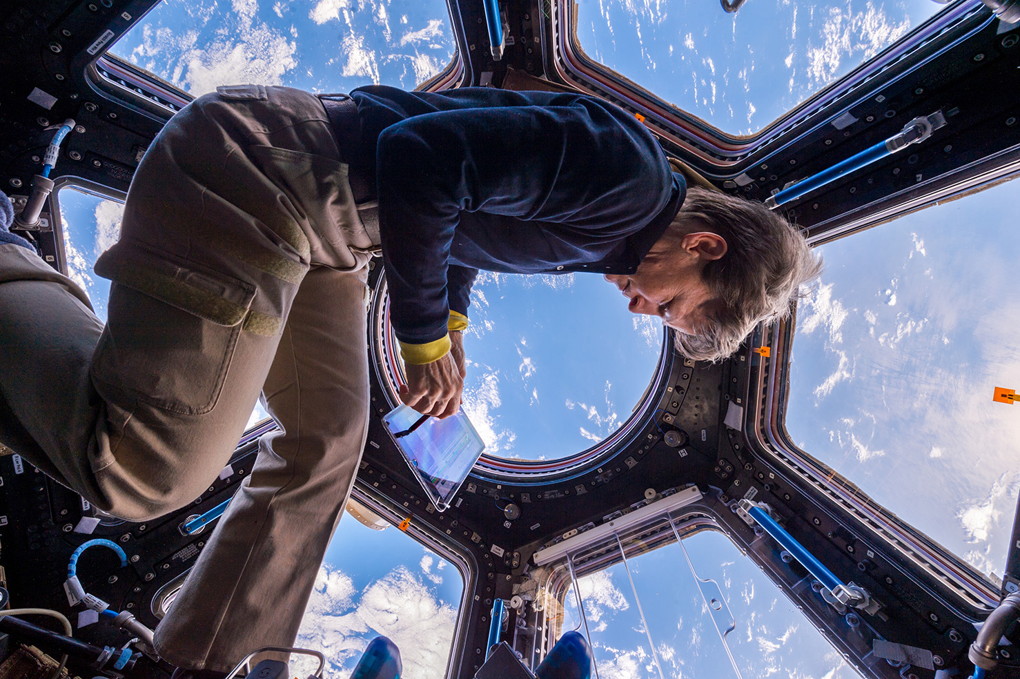 Astronaut Peggy Whitson using NASA's Playbook scheduling tool in the International Space Station