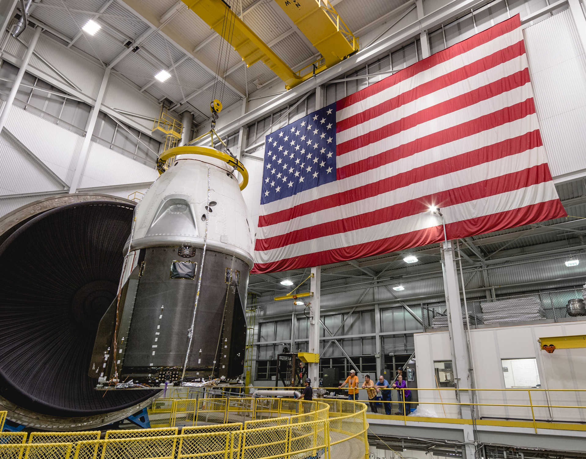 The SpaceX Dragon crew vehicle being prepared for thermal Vacuum Testing at the In-Space Propulsion Facility