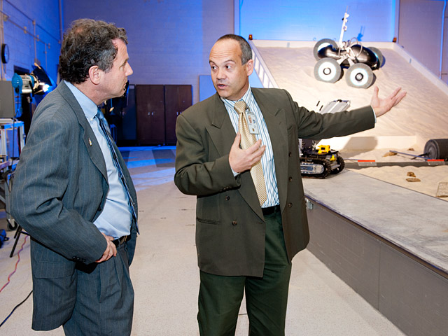 Ohio Senator Sherrod Brown receives an overview of the Simulated Lunar Operations Laboratory at the Engine Research Building