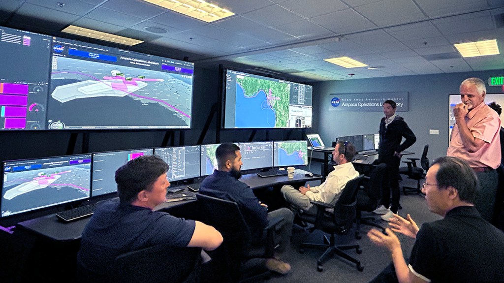 NASA researchers from the Human Systems Integration Division's Airspace Operations Laboratory (AOL) participating in an Upper Class E Traffic Management (ETM) research study