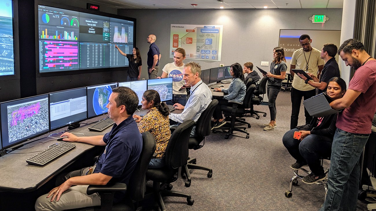 NASA researchers from the Human Systems Integration Division's Airspace Operations Laboratory (AOL) are conducting an Unmanned Aircraft System (UAS) Traffic Management (UTM) research simulation