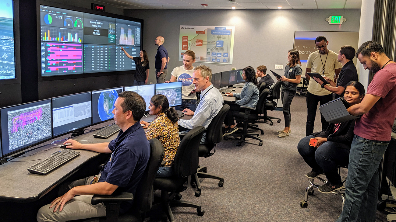 NASA researchers from the Human Systems Integration Division's Airspace Operations Laboratory (AOL) are conducting an Unmanned Aircraft System (UAS) Traffic Management (UTM) research simulation
