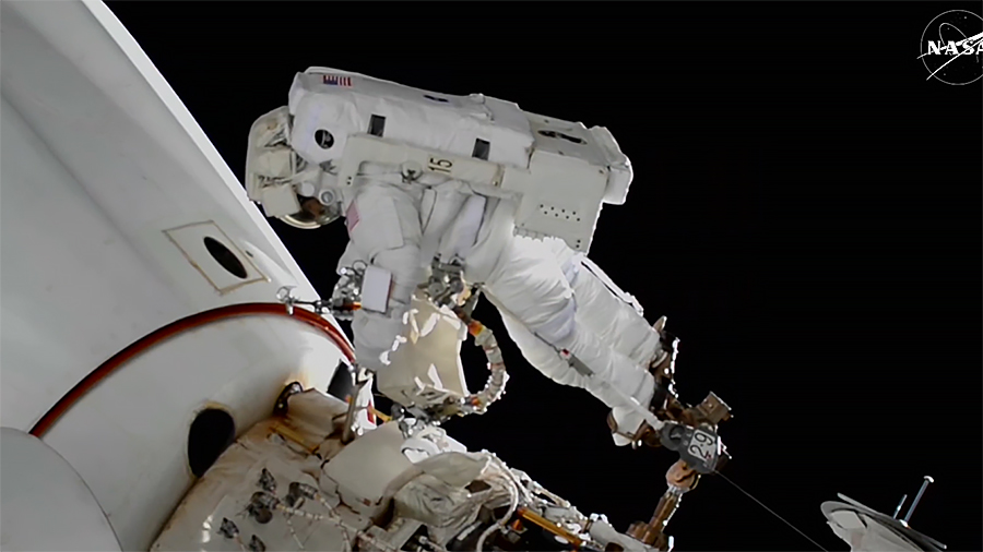 Astronaut Suni Williams replaces a planar reflector, a visiting vehicles navigation device, near the SpaceX Dragon crew spacecraft docked to the Harmony module's space-facing port during her eighth spacewalk.