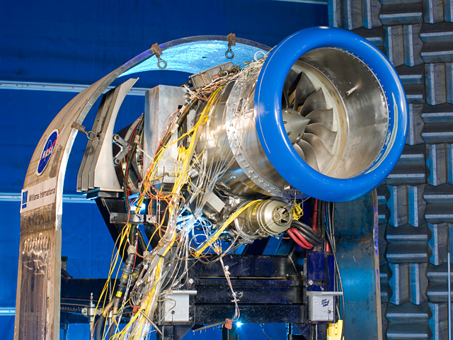 A test rig is assembled at NASA’s Glenn Research Center to evaluate the noise reduction of a newly -developed metallic foam liner