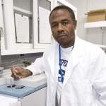 Dr George Cooper analyzes metoritic material by injecting samples into gas chromatograph-mass spectrometer. This instrument separates very complicated molecular mixtures into individual componds that are more easily identified. ARC-2011-ACD11-0142-003