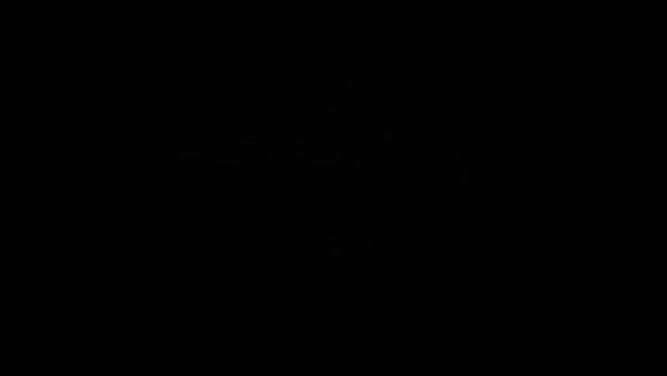 A video of an aircraft motor spinning slowly against a black background. Halfway through the video, the top portion of the motor breaks apart to reveal the inside as the camera zooms in.