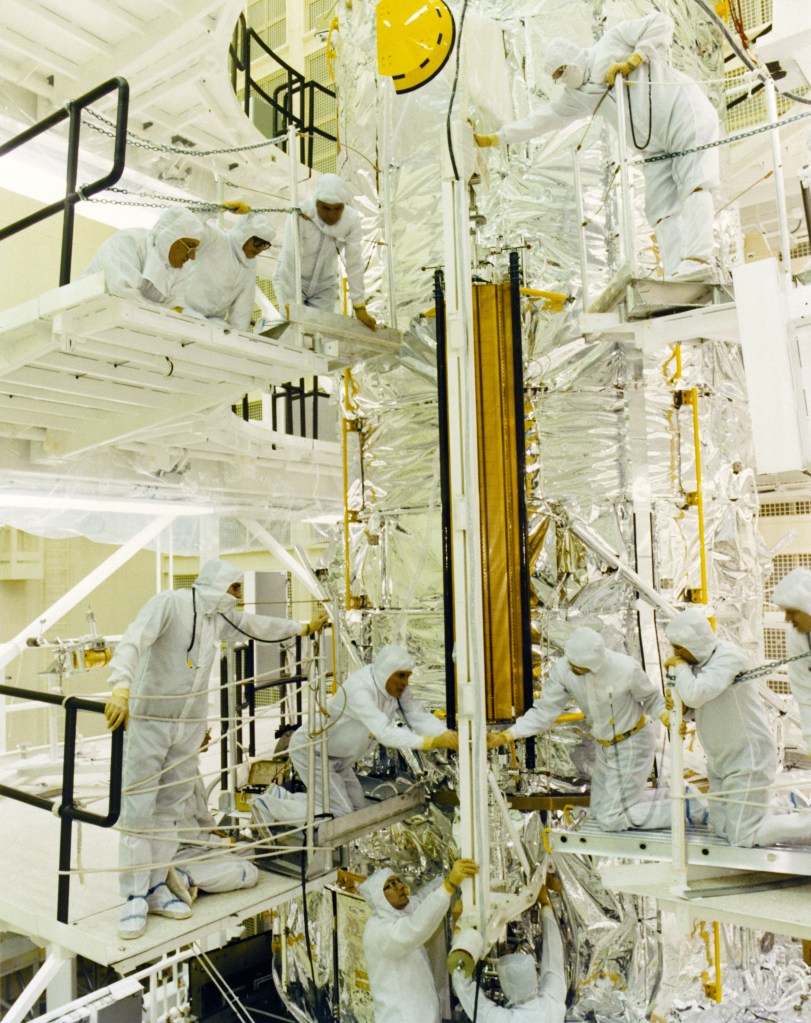 Engineers and Technicians conduct a fit check of a solar array