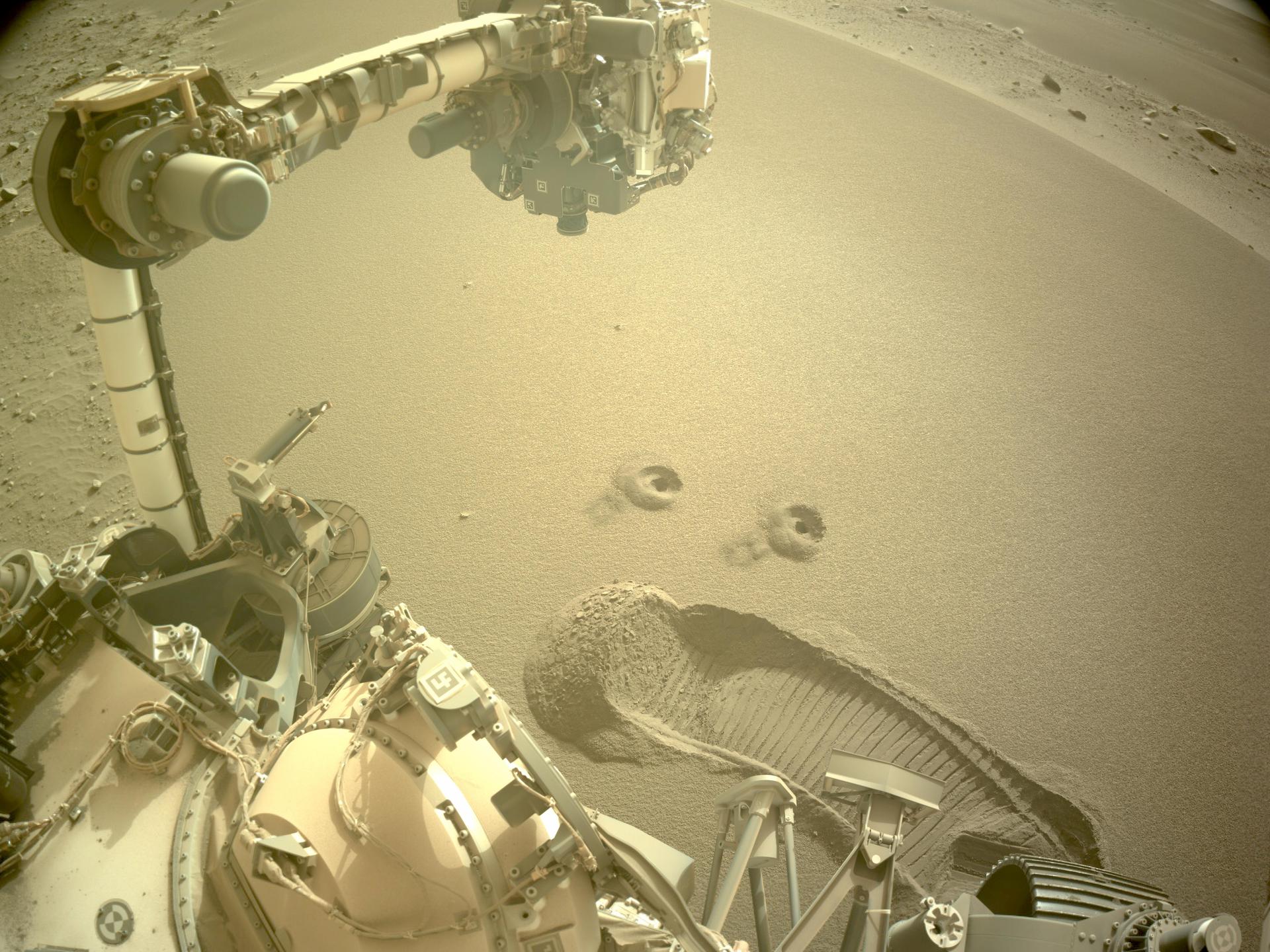 Imprints in Mars dust from a rover's robotic arm