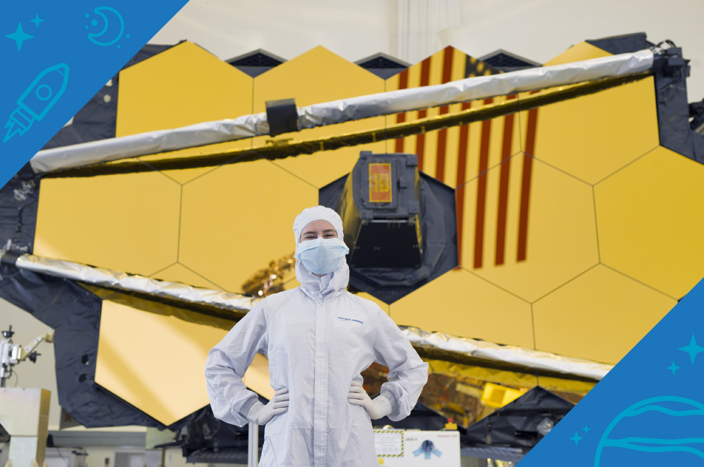 Elaine Stewart, contamination control engineer, standing in front of the James Webb Space Telescope
