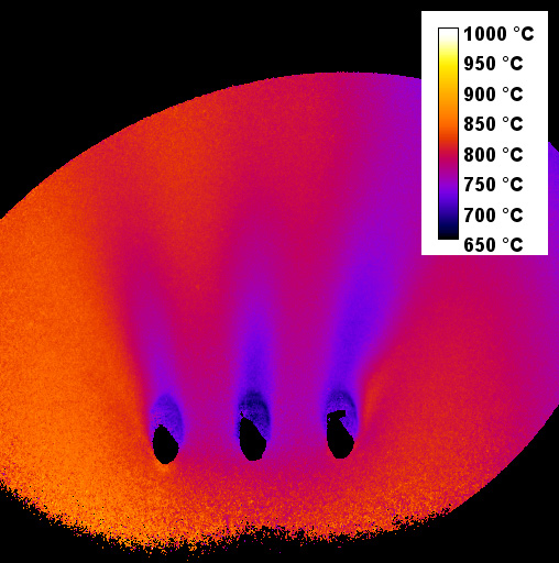 Thermal image showing a heat map with a range from 650°C to 1,000°C, featuring three blue streaks indicating cooler regions.