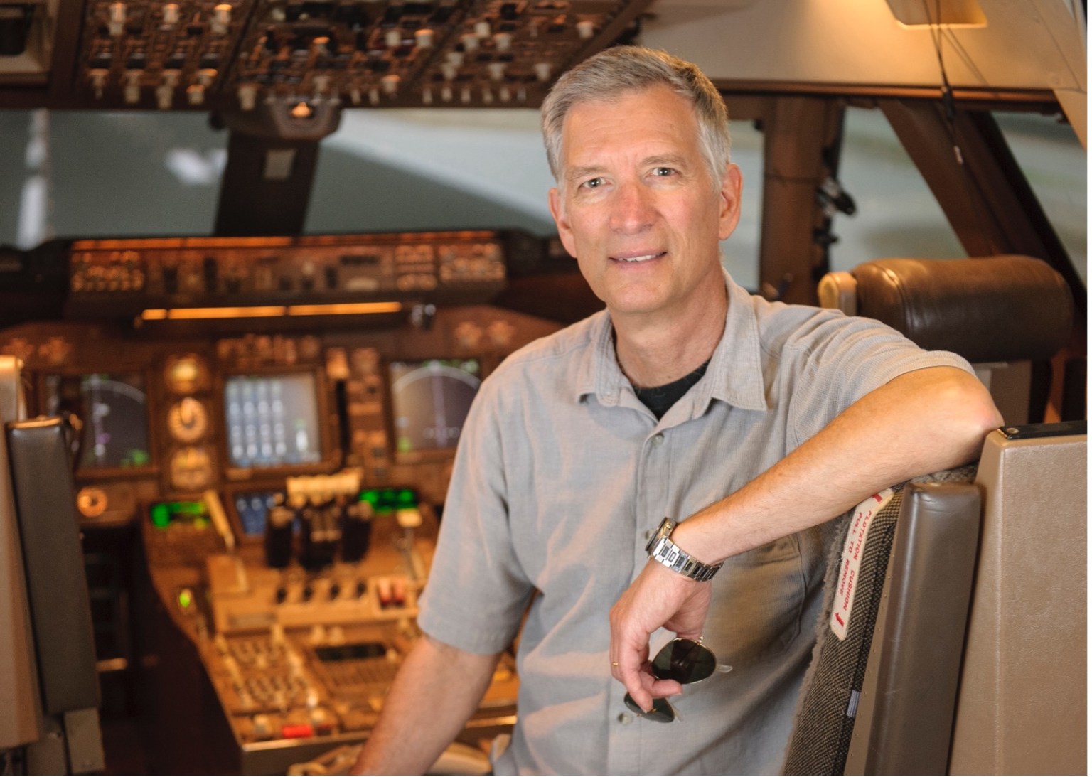 Image of NASA Research Psychologist Immanuel Barshi, sitting in a flight simulator at NASA Ames Research Center in Silicon Valley, California