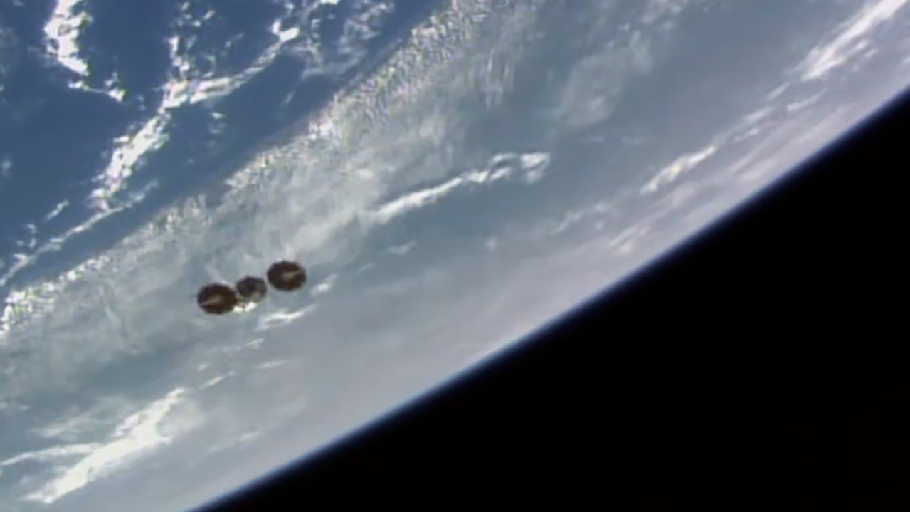 The Cygnus cargo craft departs the International Space Station as both spacecraft orited above the Atlantic Ocean.