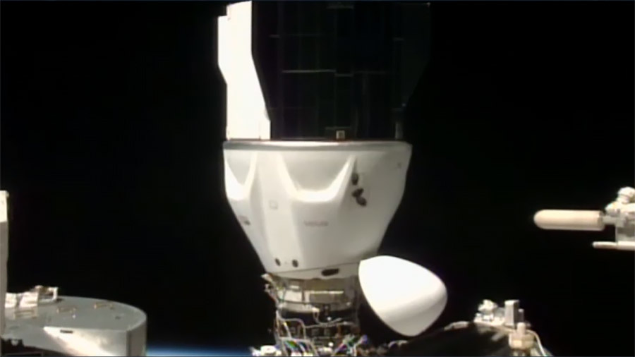 The SpaceX Dragon spacecraft carrying four SpaceX Crew-9 members is docked to the Harmony module's space-facing port on the International Space Station.