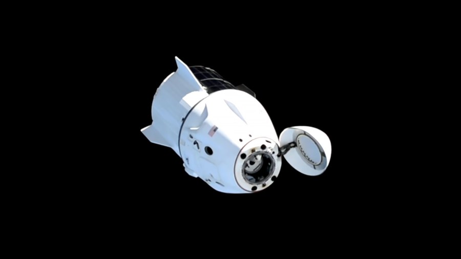The SpaceX Dragon spacecraft with four Crew-9 members aboard departs the International Space Station moments after undocking from the Harmony module's space-facing port.