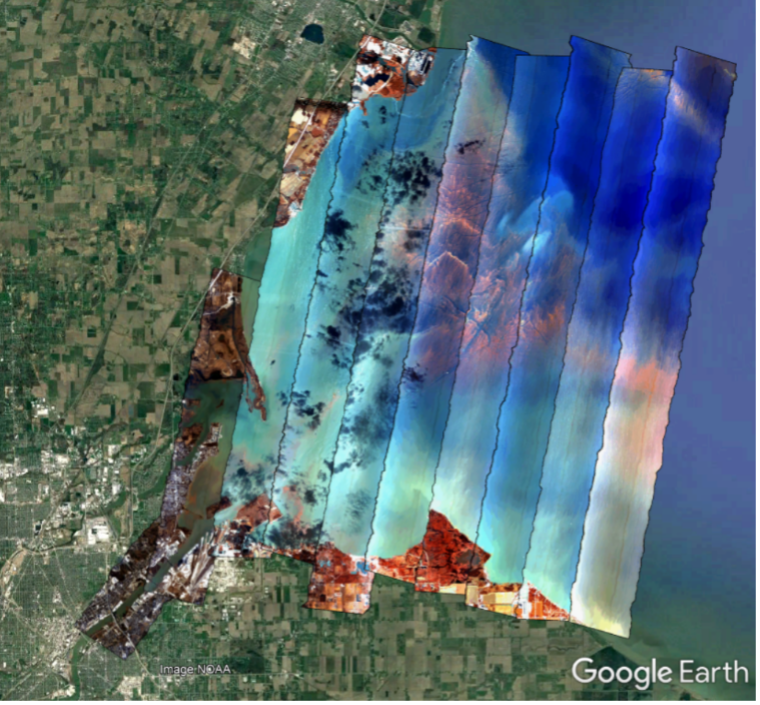 Multiple composite hyperspectral images are overlaid on Google Earth showing the harmful algal blooms in Western Lake Erie.