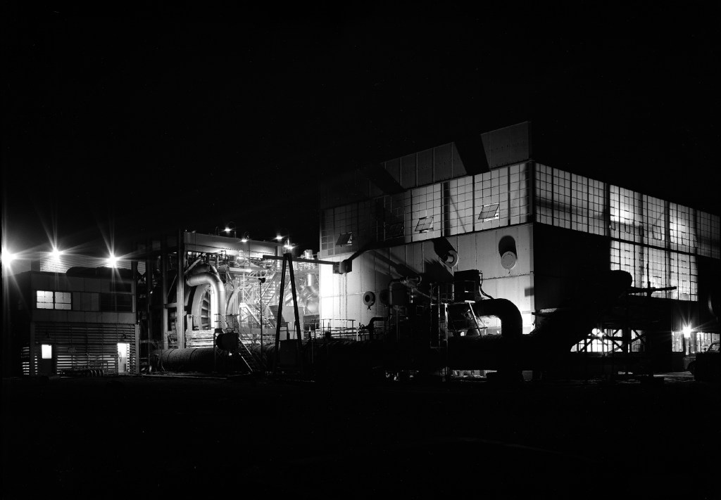Exterior view of test facility at night.