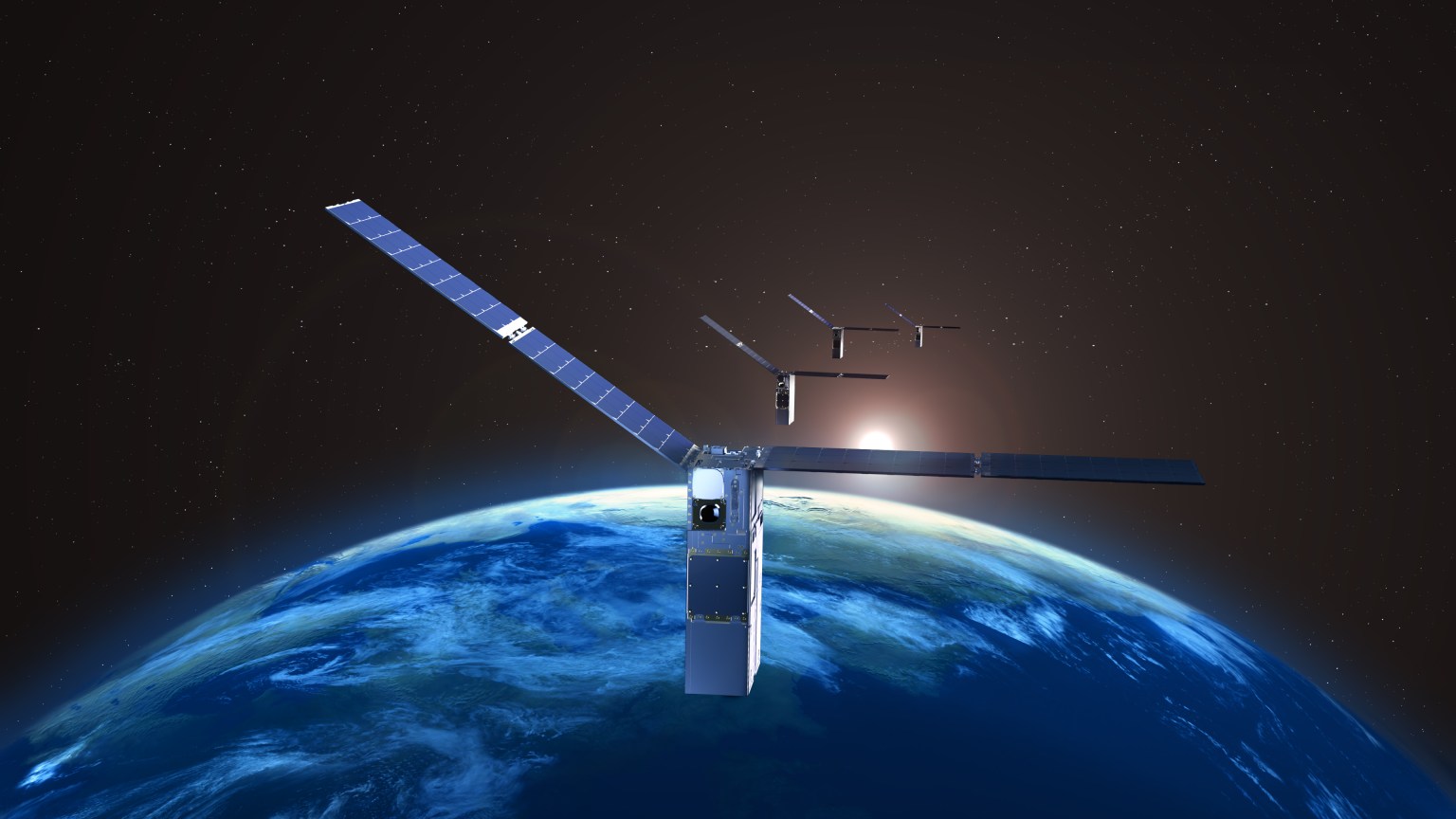 Illustrated image of four satellites orbiting Earth as the sun rises over the planet's horizon.