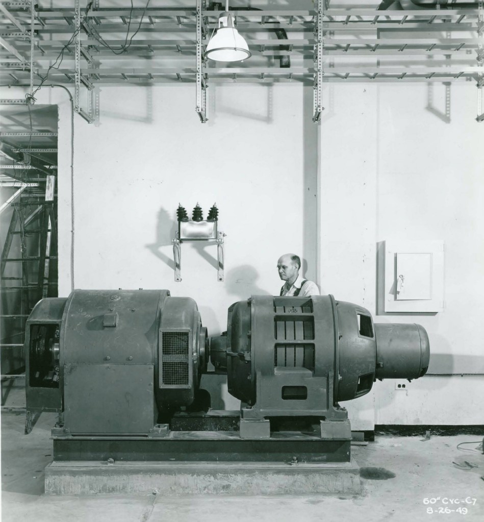 Man with compressor unit.