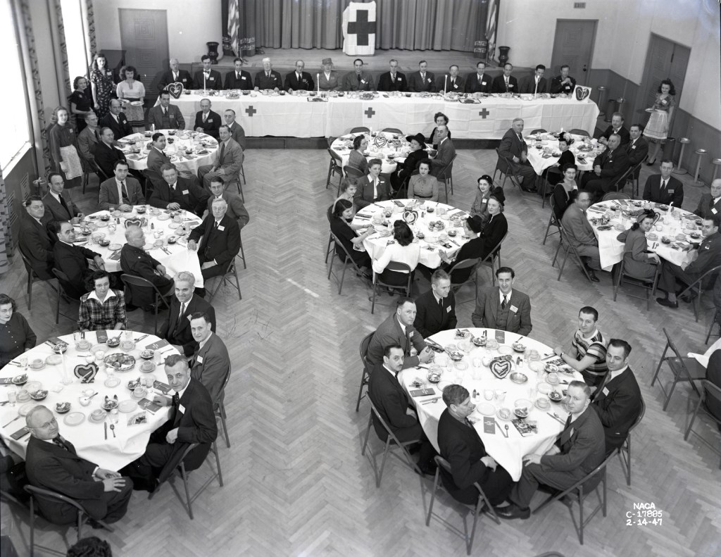 View from above of tables in auditorium.