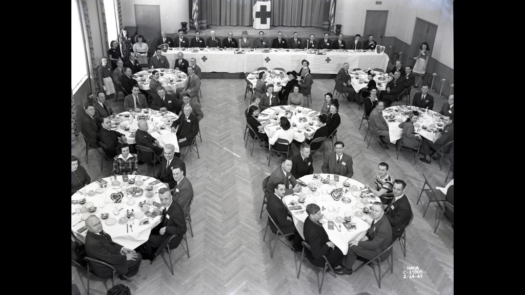 View from above of tables in auditorium.