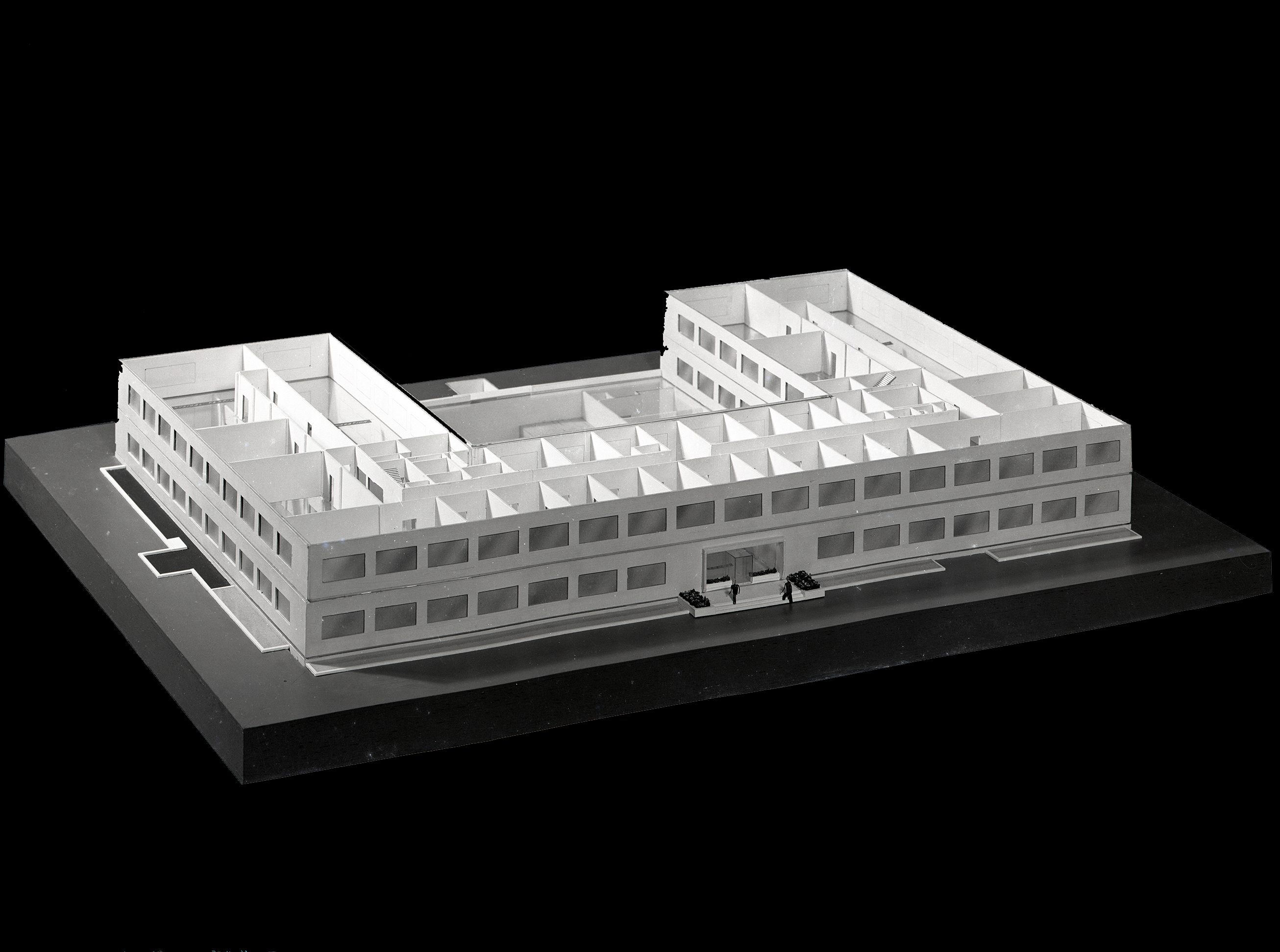 Model of two story U-shaped building.
