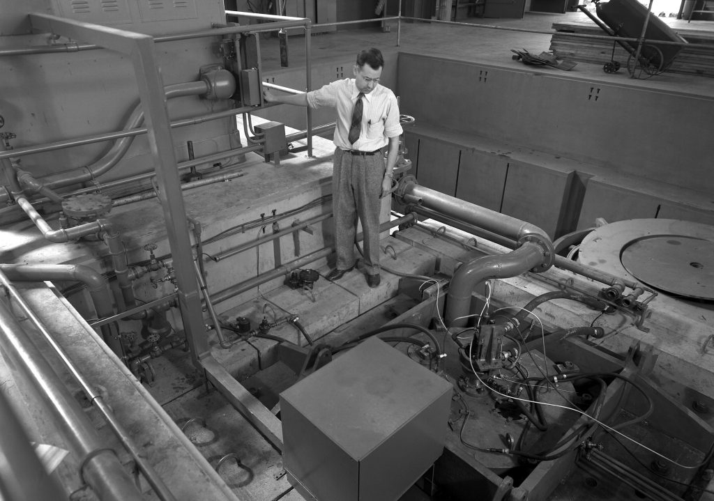 Man looks down into spin pit.