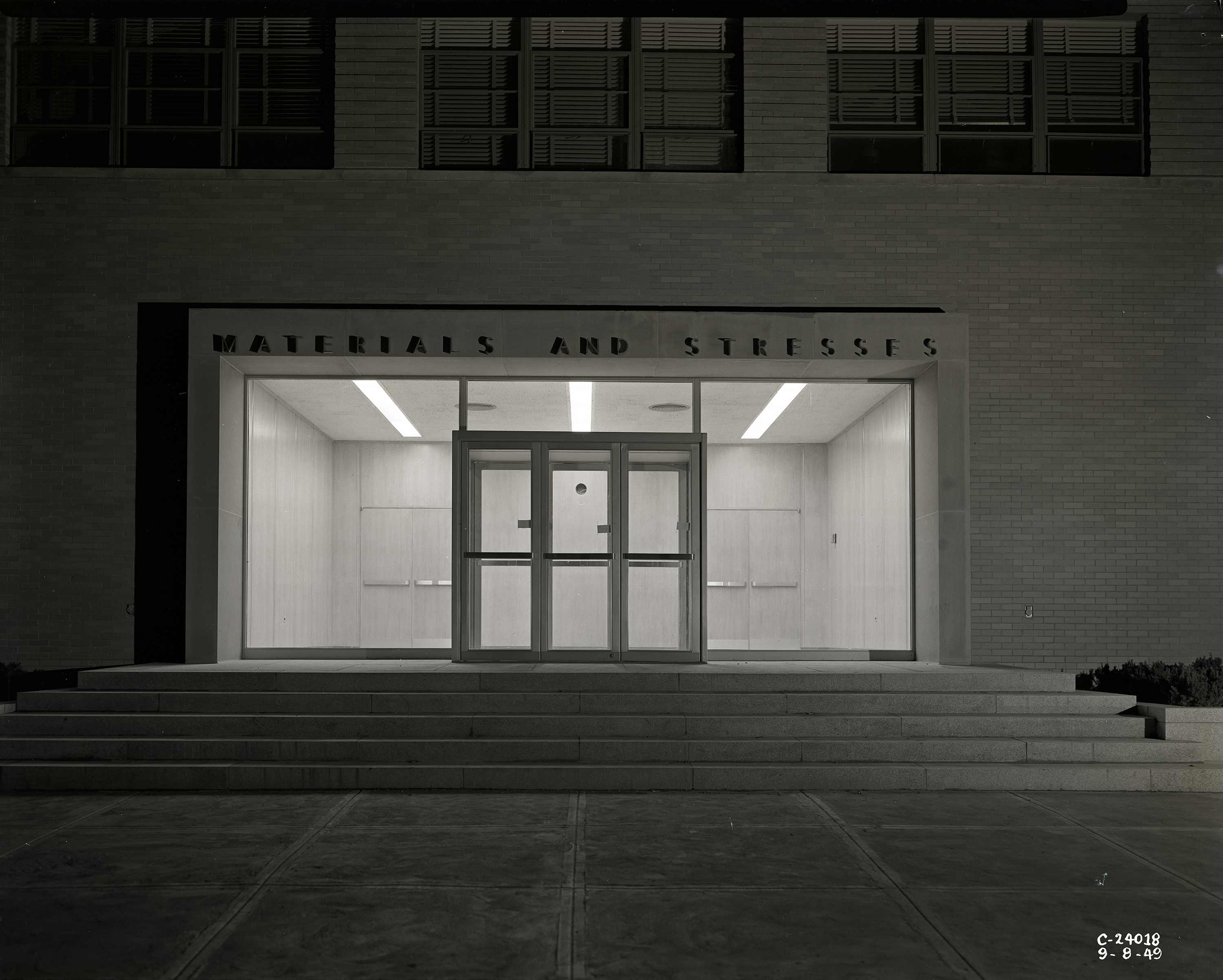 Building entrance at night.