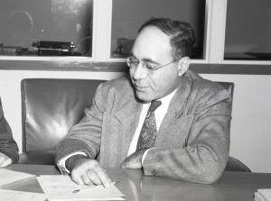 Man sitting at desk.