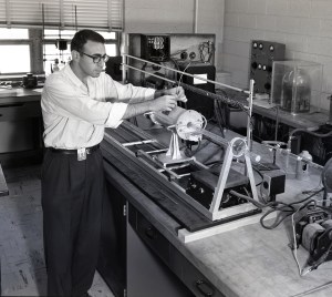 Man with test apparatus.