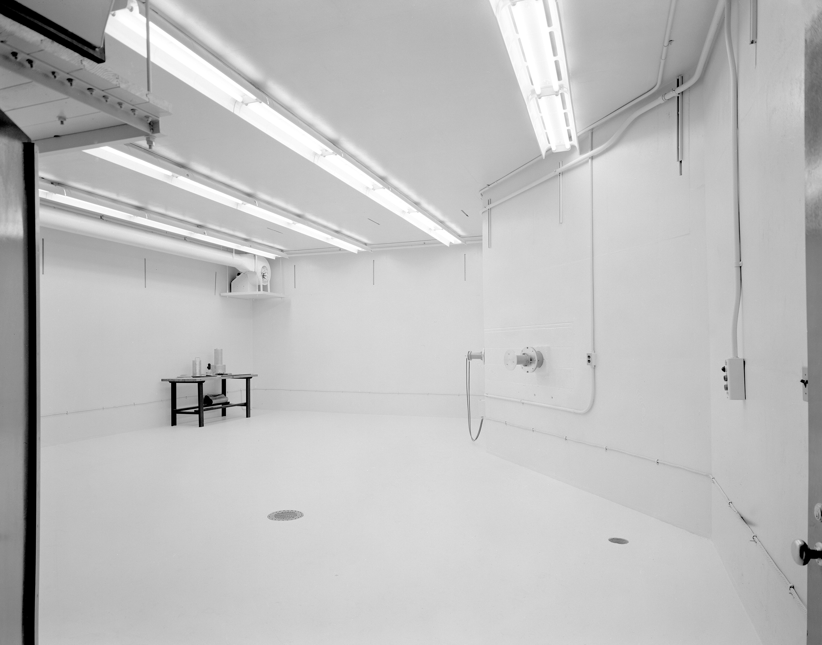 Large empty room with white walls.