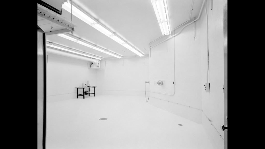 Large empty room with white walls.