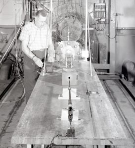 Man with table-mounted impact gun.