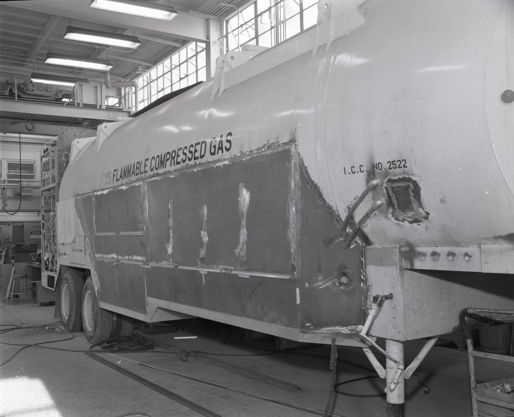 Tanker truck inside facility.