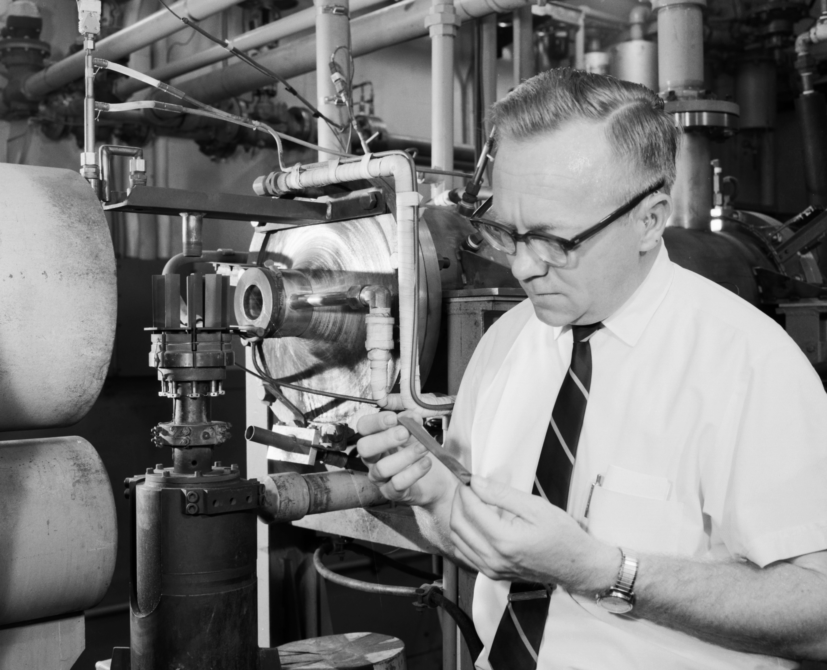 Man holds test sample.