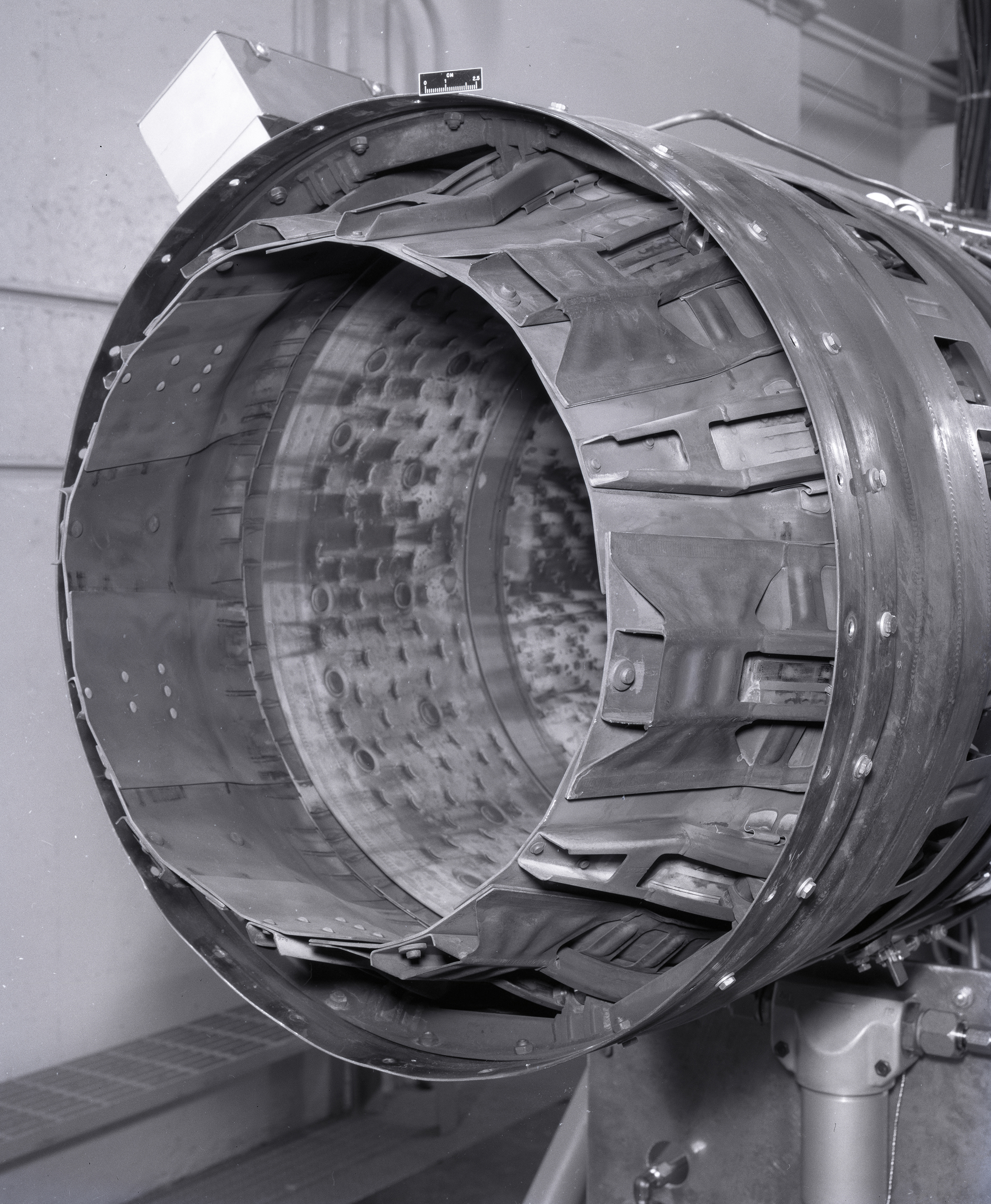 Close up of nozzle on jet engine.