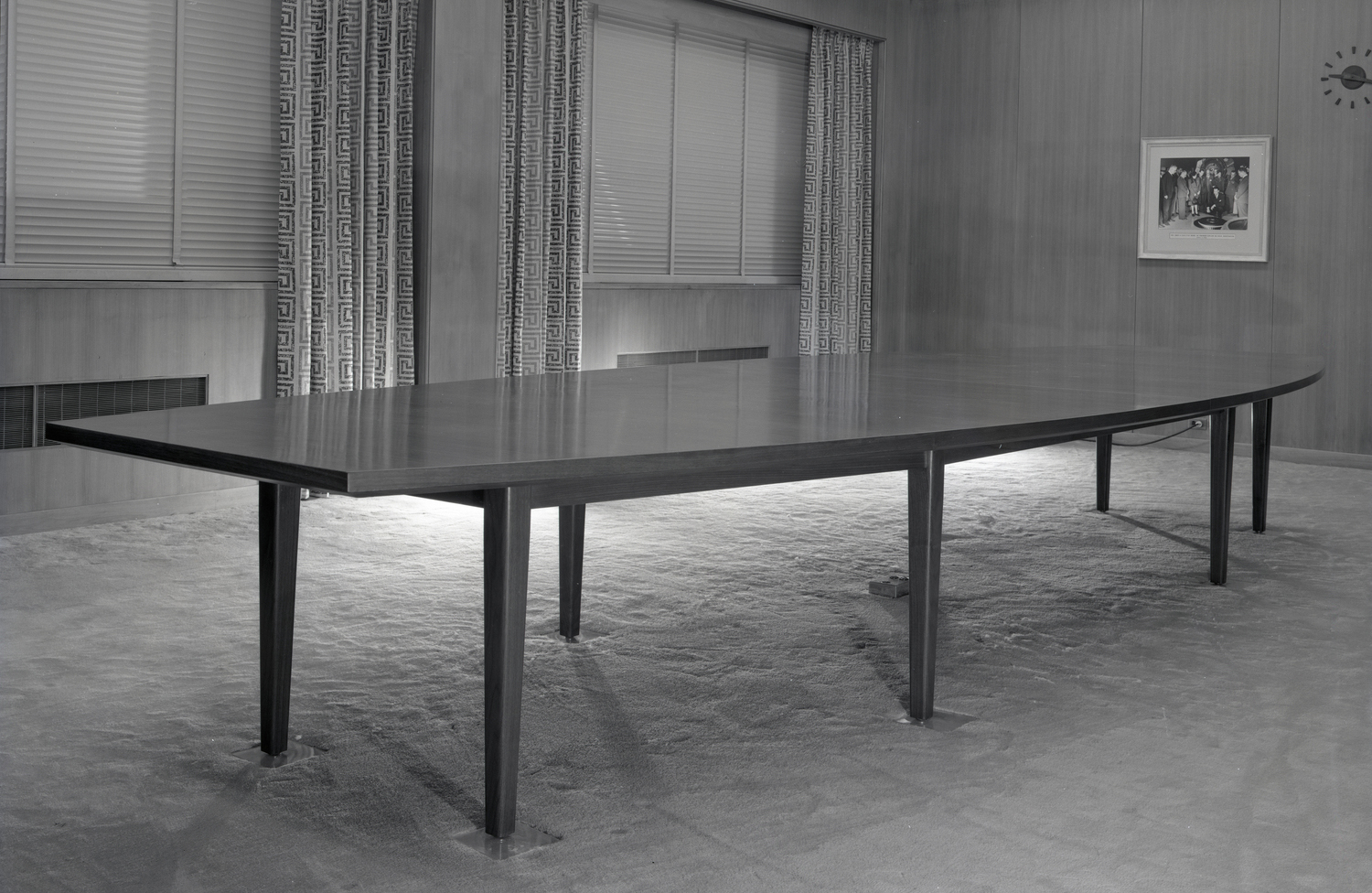 Conference table in empty room.