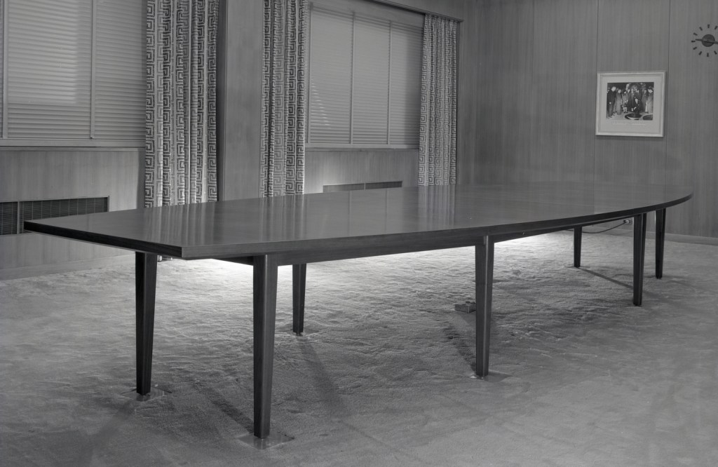 Conference table in empty room.